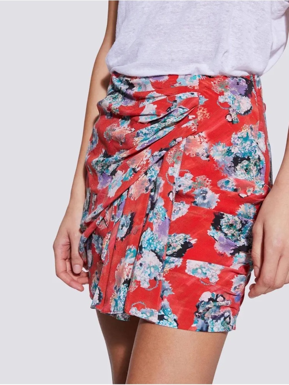 IRO Suppie floral print mini skirt featuring a wrapped deisgn.